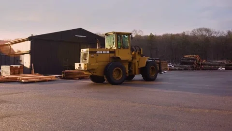 Front End Loader in Lumber Yard (4k) Video stock 168330916