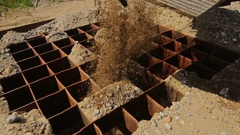 Front end loader on a pile of graded stone Stock Footage 70353732