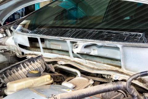 Front engine bay of car during major repair with removed hood and exposed Stock Photos