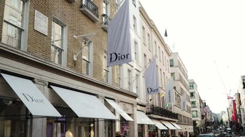 A front exterior view of the Dior store on  New Bond street, London Stock Footage 146243902