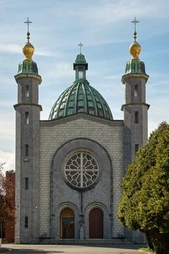 The front facade and copper dome of the Cathedral of Saint Mary and Saint Ann Stock Photos