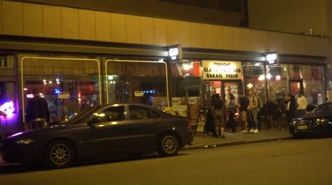The front façade of bar Loose in the Saturday night in Annankatu, Helsinki Stock Footage 66257554