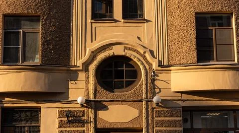 The front facade of a building showcasing a round window design Stock Photos