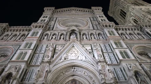 Front facade of the Cathedral of Santa Maria del Fiore by night. Tilt 4K Stock Footage 240480306
