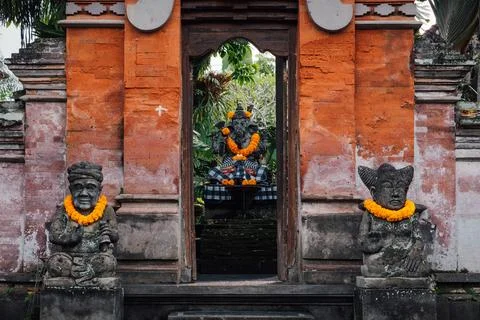 Front facade of a construction displaying Buddhist statues Stock Photos