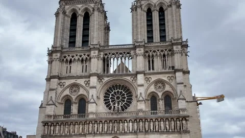 Front facade of Notre-Dame Cathedral in Paris featuring twin towers, Gothic Stock Footage 346899601