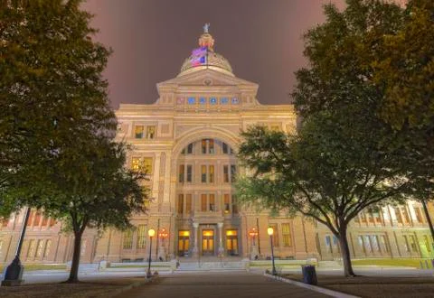 The front façade of the texas capitol building at night Stock Photos