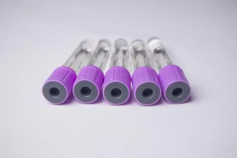 Front-facing, close-up shot of five empty medical blood collection tubes wi.. Stock Photos