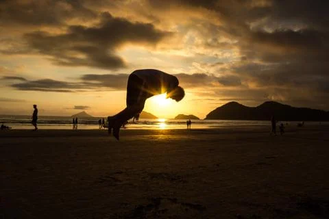 Front flip at the beach Stock Photos