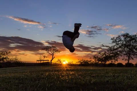 Front flip at Sunset Stock Photos