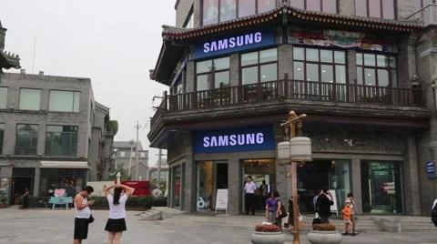 Front Gate and Samsung store of the Qianmen shopping Street, Beijing Stock Footage 57254975
