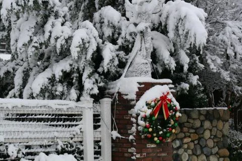 Front gate covered in snow Stock Photos