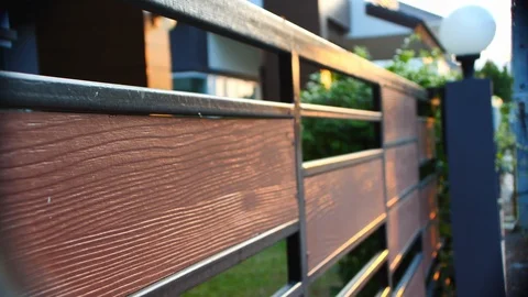 Front gate sliding modern style of decorated exterior house Stock Footage 89785314