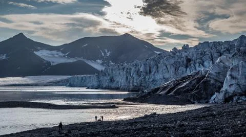 Front of glacier at dusk Stock Photos