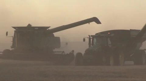 Front of Grain Cart &amp; Combine Stock Footage 35595208