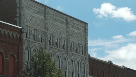 The front of a grey brick building Stock Footage 131735605