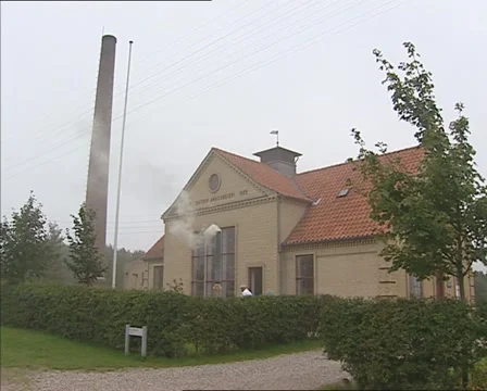 Front historic diary co-opererative in operation. NYVANG, DENMARK Stock Footage 52996089