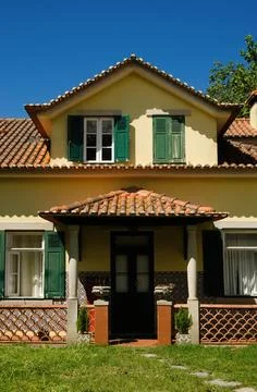 Front of a house aged by time Stock Photos