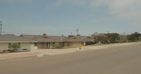 Front left driving plate - Catalina Blvd at Point Loma Ave, San Diego Video stock 101956473