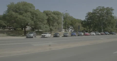Front left driving plate - East Dean Keaton Street at San Jacinto Boulevard, Stock Footage 253498722