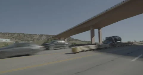 Front left driving plate - Highway 160 at Highway 550 Durango Stock Footage 288538539