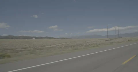 Front left driving plate - Highway 285 at Mile 96 Saguache County Stock Footage 288871269