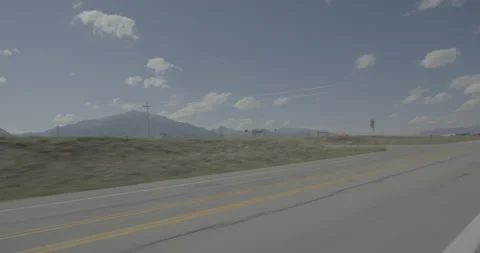 Front left driving plate - Highway 285 at Mile 139 Cheffee County Stock Footage 288923049