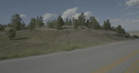 Front left driving plate - Highway 24 at Mile 226 Park County Stock Footage 288952393