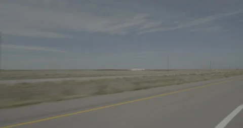 Front left driving plate - Highway 385 at Mile 102 Alliance Stock Footage 290057739