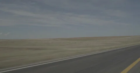 Front left driving plate - Highway 87 at Arthur Road Sheridan County Stock Footage 290077114