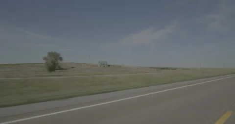 Front left driving plate - Highway 20 at 430th Trail Hay Springs Stock Footage 290096181