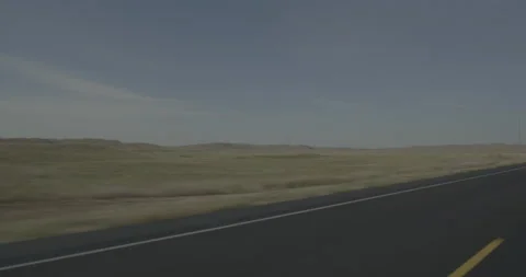 Front left driving plate - Highway 20 at Mile 121 Cherry County Stock Footage 290138153