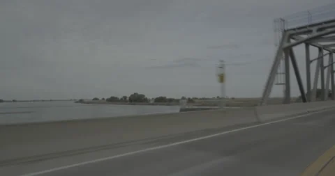 Front left driving plate - Highway 12 at Mile 5, Rio Vista Vídeos de archivo 293345397