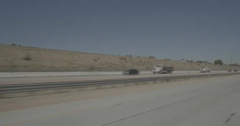 Front left driving plate - Highway 14 at West Avenue O, Palmdale Stock Footage 293691615