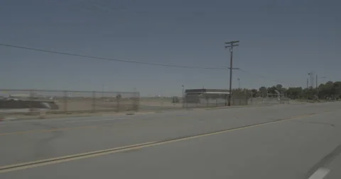 Front left driving plate - Highway 58 at Myer Road, Mojave Stock Footage 293709679