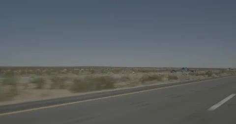 Front left driving plate - Highway 58 at 70th Street, California City Stock Footage 293715566