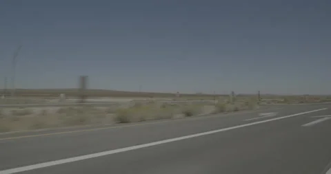 Front left driving plate - Highway 58 at California City Boulevard, California Stock Footage 293716821