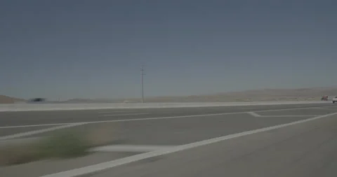 Front left driving plate - Highway 15 at Highway 58, Barstow Stock Footage 293783111