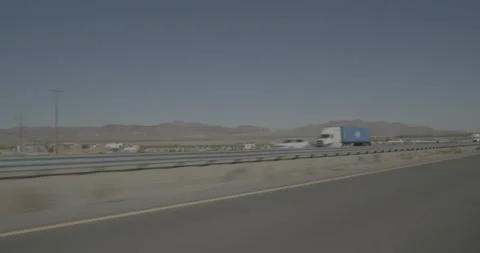 Front left driving plate - Highway 15 at Fort Irwin Road, Yermo Stock Footage 293785519