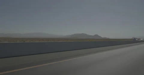 Front left driving plate - Highway 15 at Mile 16, Jean Stock Footage 294546506