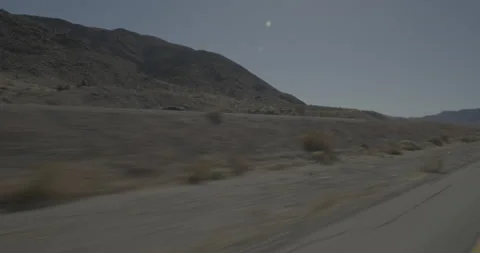 Front left driving plate - Highway 15 at Mile 130, Zzyzx Vídeos de archivo 294587150