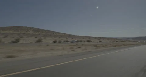 Front left driving plate - Highway 15 at Mile 123, Cronese Valley Stock Footage 294591286