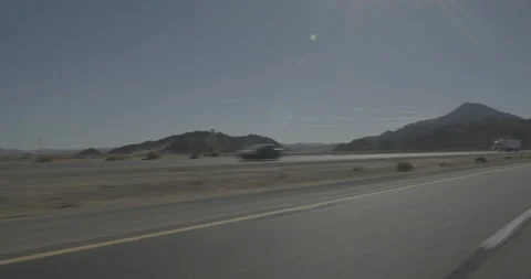 Front left driving plate - Highway 15 at Mile 121, Cronese Valley Stock Footage 294592781