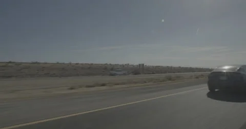 Front left driving plate - Highway 15 at Mile 104, Manix Stock Footage 294687917