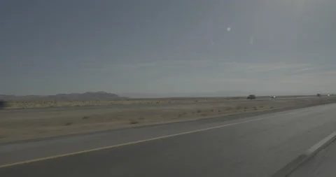 Front left driving plate - Highway 15 at Mile 102, Manix Stock Footage 294688316