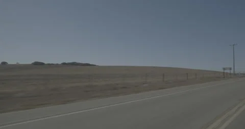 Front left driving plate - Highway 1 at San Simeon Road, San Simeon Vídeo Stock 294918093