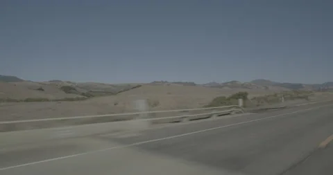 Front left driving plate - Highway 1 at Mile 59, San Simeon Stock Footage 294937958