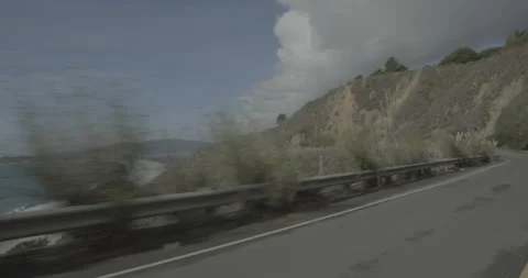 Front left driving plate - Highway 1 at Mile 13, Stinson Beach Stock Footage 295033125