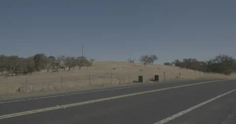 Front left driving plate - Highway 120 at Mile 13, Yosemite Junction Stock Footage 295044682