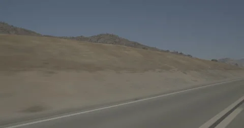 Front left driving plate - Highway 180 at Mile 88, Yokuta Valley Stock Footage 295206035